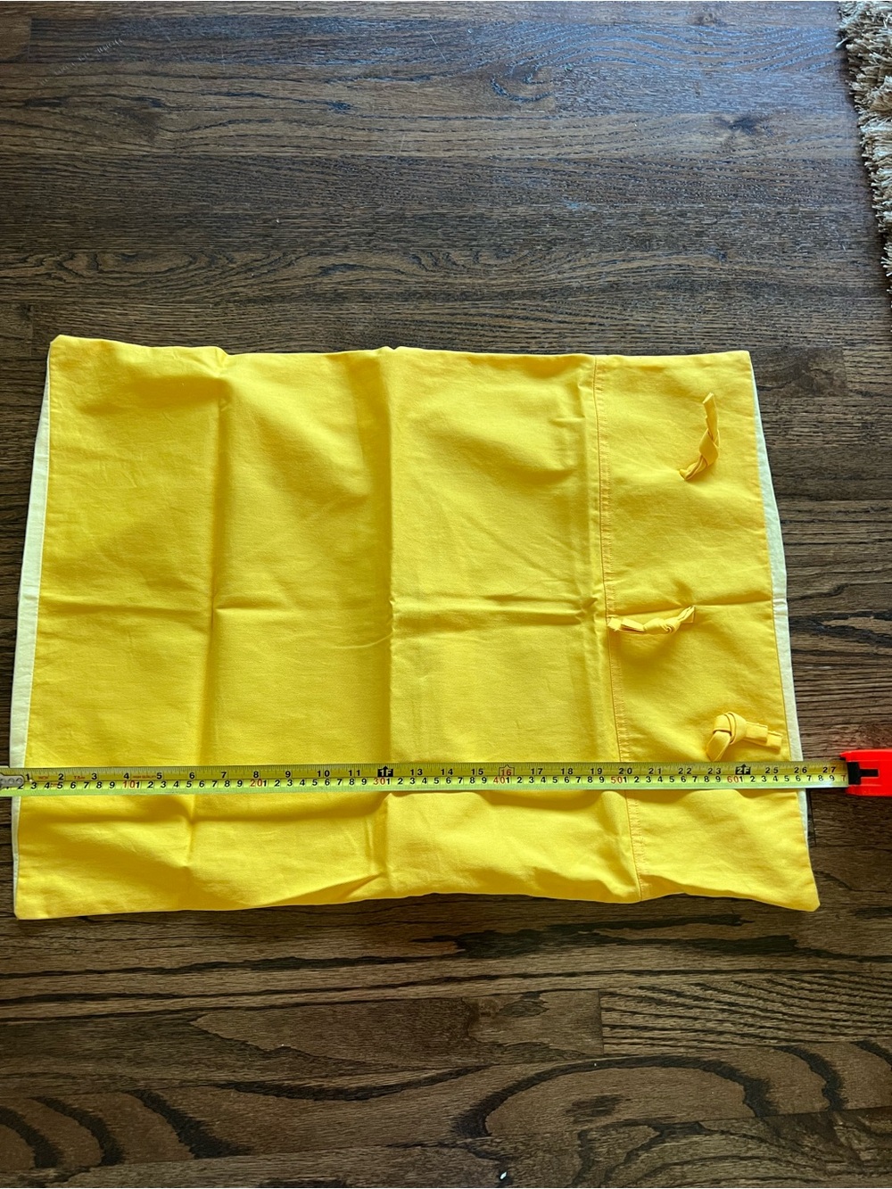 The Laura Ashley Lifestyle yellow standard pillowcase.